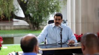 Venezuela's President Nicolas Maduro (C) speaks during his weekly broadcast "En contacto con Maduro" (In contact with Maduro) in Caracas, Venezuela November 13, 2016.