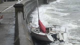 Yacht goes abroad in high winds