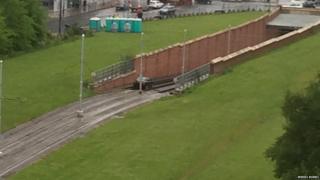Car stuck on tram line