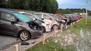 Smashed parked cars
