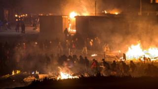 Image result for France migrants: Huge fire guts Grande-Synthe Dunkirk camp