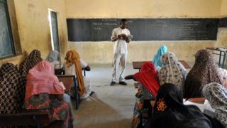 Female students in the classroom.