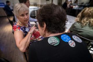 Women in deep conversation