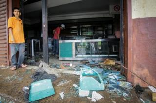 Ibikorwa byo gusahura byabaye byinshi nko muri iri duka rya ricuruza imigati mu gace ka Ciudad Bolivar