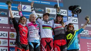 Rachel Atherton, middle, celebrating her win