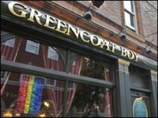 Rainbow flag in pub window