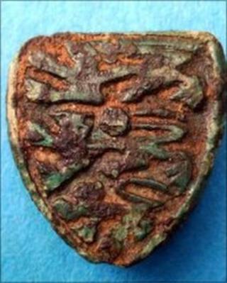 Three lions found on a horse's harness in Coventry