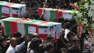 Mourners at Saturday's mass funerals