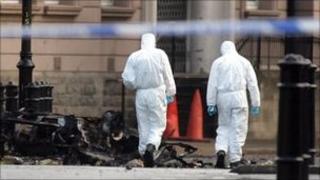 Forensic experts at bomb scene