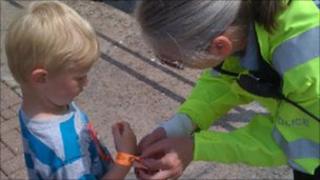 Child wearing Safety Band