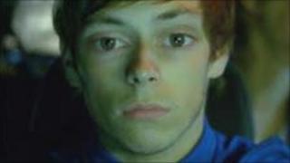 Image from drug driving advert of a boy with enlarged eyes