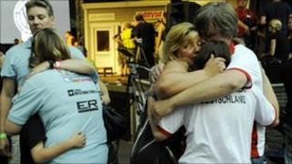Spectators comfort each other after the accident - 8/08/10