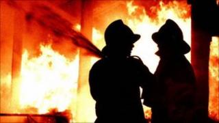 Firemen fighting fire