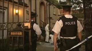 Police at the scene following the death of a man in Armagh city