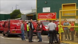 Sacked workers outside the Connaught building