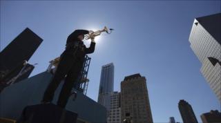 An honour guard plays the trumpet at the site of Ground Zero in New York September 11 2010