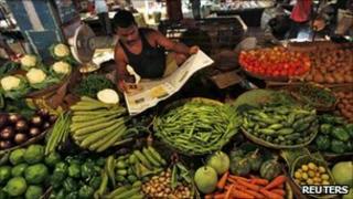A vegetable seller in a market in Kolkata