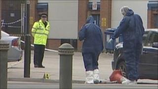 Forensic officers at the scene