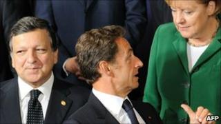 EU Commission President Jose Manuel Barroso (left), French President Nicolas Sarkozy, German Chancellor Angela Merkel