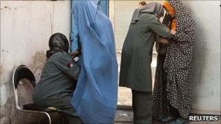Women searched at polling station in Herat. 18 Sept 2010