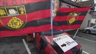 Car with Down flags