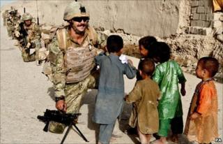 Ministry of Defence handout photo of a joint patrol of Royal Marines in Sangin
