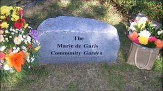 The Marie de Garis Community Garden dedication stone
