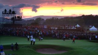 The 10th green as late evening light fades in the distance