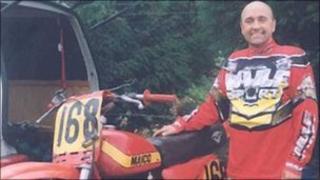Stephen Allan Williams with one of his motorcycles