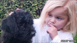 Evie Gatenby and puppy - courtesy of Selby Times