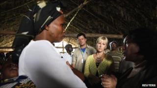 Margot Wallstrom, the UN's special representative on sexual violence, listens to villagers in Kitchanga, in eastern Democratic Republic of Congo