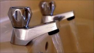 Water flowing from a tap