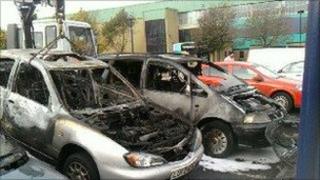 The damaged cars