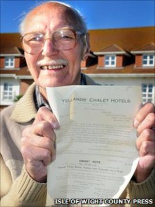 Les Townsend with his credit note outside hotel