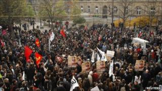 Demonstrators against pension reform gather outside the Senate in Paris, 26 October