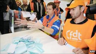 Striking employees at the Total refinery in Donges count ballots on whether to continue industrial action or not, Donges, France