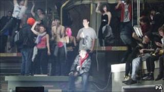 Revellers inside the suspected illegal rave in Museum Street, central London,
