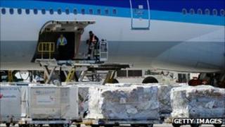 Freight being loaded onto a plane