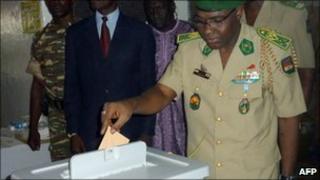 The head of the military junta, General Salou Djibo, casts his ballot in Niamey on 31 October 2010