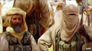 Video grab taken from Al Andalus TV by AFP shows al-Qaeda in the Islamic Maghreb militants - released 30 September 2010