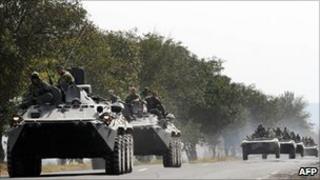 A column of Russian armoured vehicles travel on the Gori-Tbilisi road 22 August 2008
