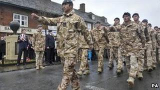 Airmen from the Royal Air Force Regiment march during a combined homecoming and remembrance parade along Wootton Bassett High Street on Thursday 11 November