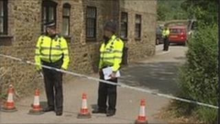 Police officers at the scene of the incident in Rogate, Chichester