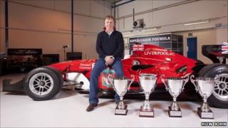 Anthony Reid with a superleague car