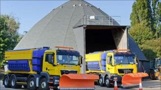 Winter maintenance vehicles at salt barn