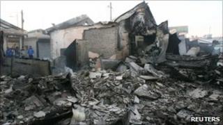 Destroyed houses are seen after they were hit by artillery shells fired by North Korea on Yeonpyeong Island