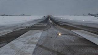Guernsey Airport's runway covered in snow