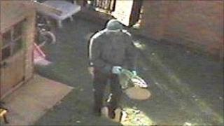 Gunman entering Mr Deakin's home