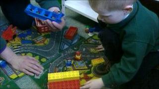 young boy playing