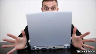 Man behind computer